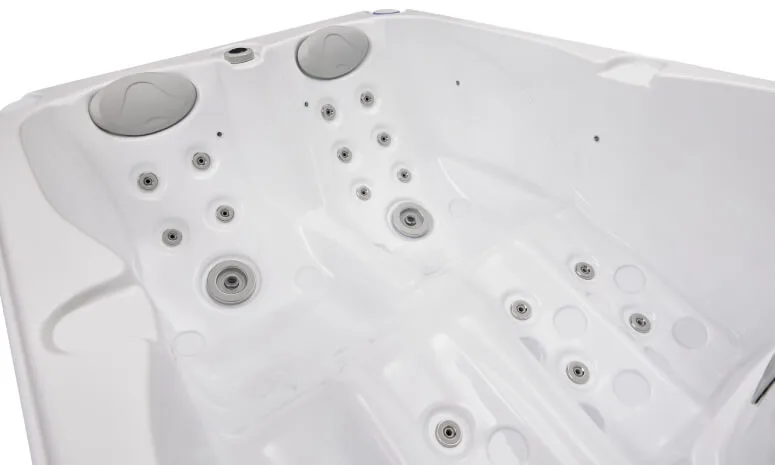 Interior view of the OF-2001 hot tub showing jets and ergonomic seating