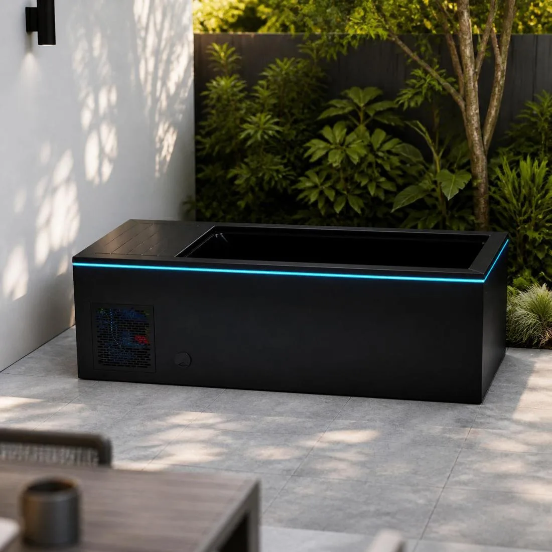 Front view of the black OF-CP01 cold plunge tub with illuminated LED accent lighting