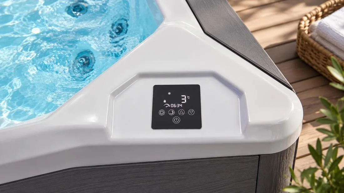 Integrated Digital Touchscreen Interface Top-down view of digital touch control panel on cold plunge ledge