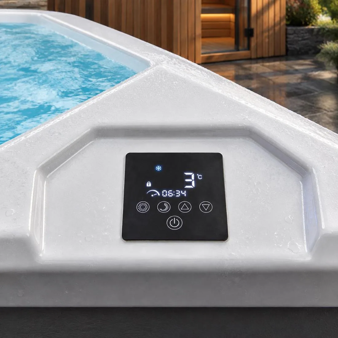 Digital Touchscreen Temperature Interface Close-up of an integrated digital touch control panel on a smooth white acrylic tub ledge