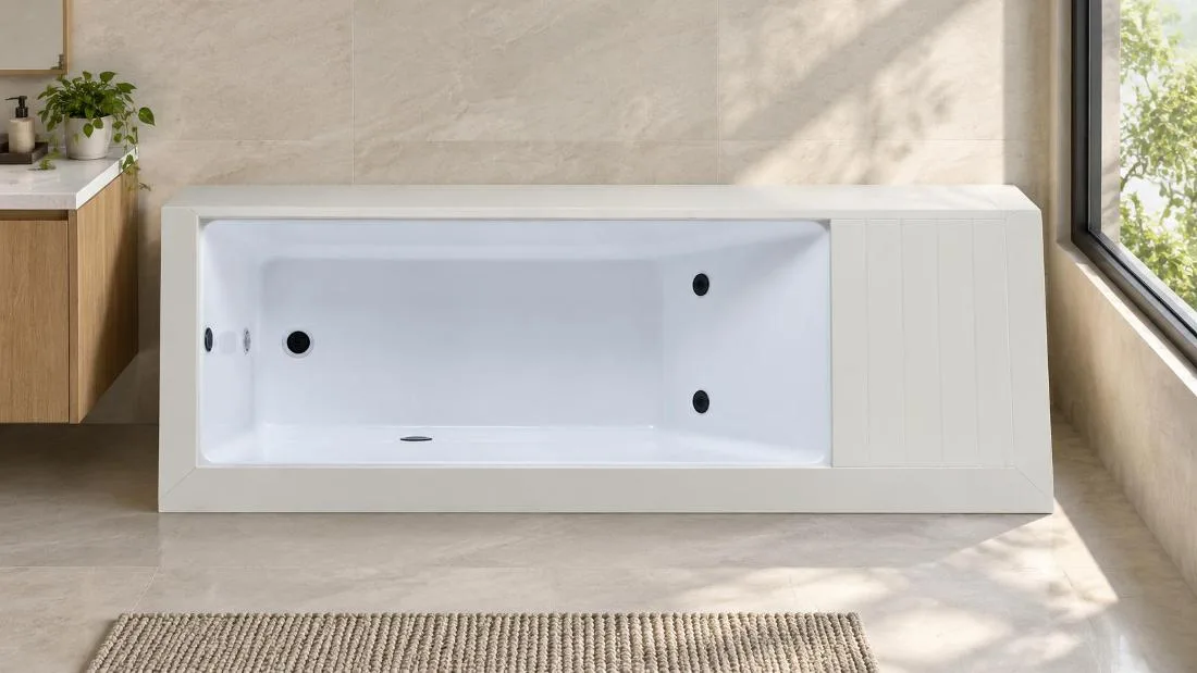 Interior tub basin and integrated plumbing Overhead plan view of the white cold plunge tub interior showing the floor drainer, overflow port, and dual jet nozzles