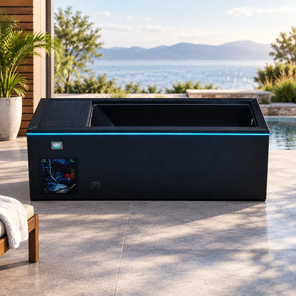 Black OF-CP01 Cold Plunge Tub with Perimeter LED Lighting Studio view of the black OF-CP01 cold plunge tub with glowing blue perimeter LED strip and side chiller ventilation grille