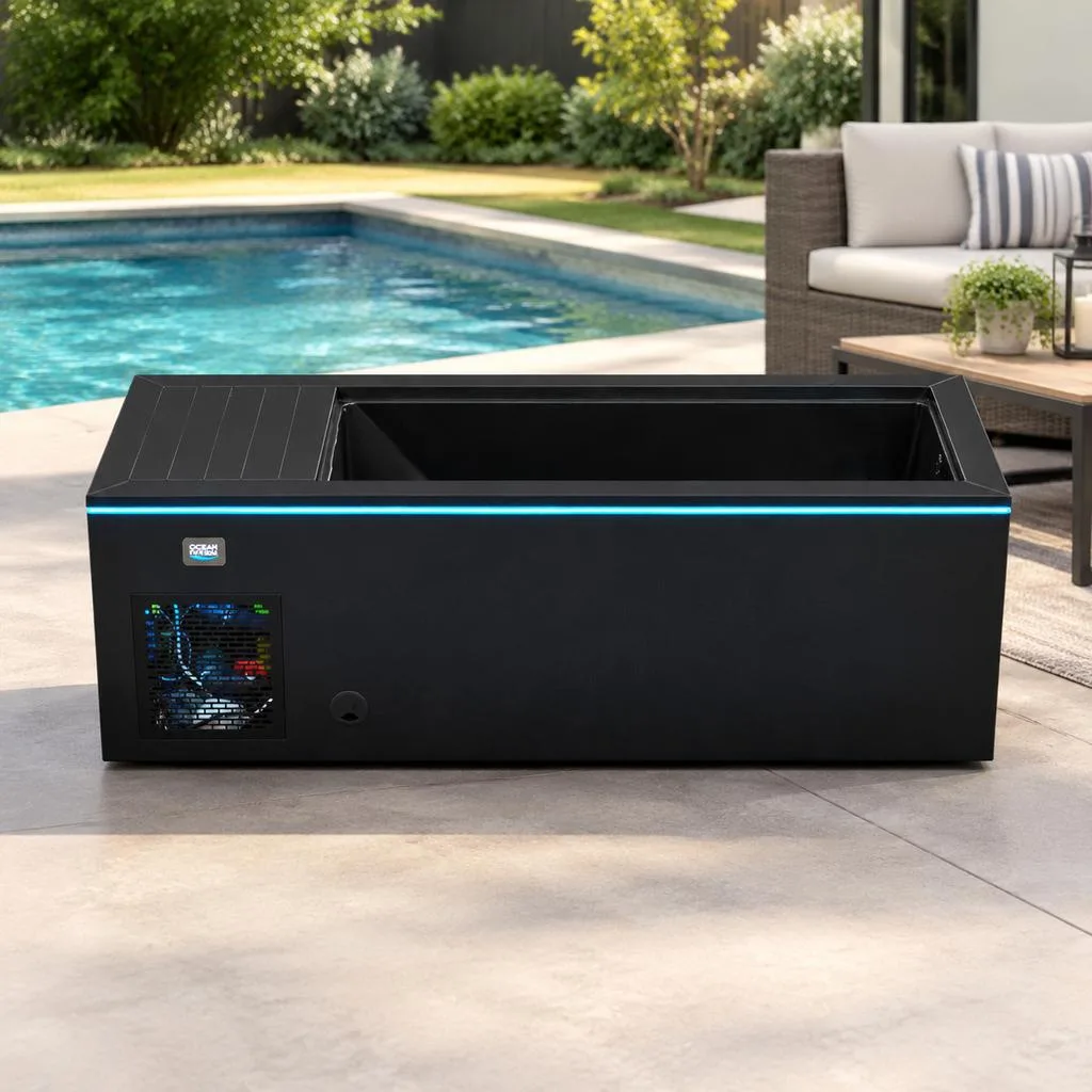 Black OF-CP01 Integrated Cold Plunge Tub Front view of the black OF-CP01 integrated cold plunge tub with blue perimeter LED lighting and side ventilation grille