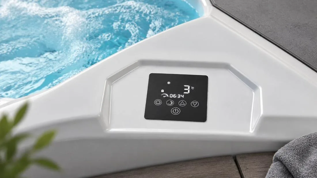 Digital touch control panel Close-up view of the digital touch control panel on the white acrylic tub ledge