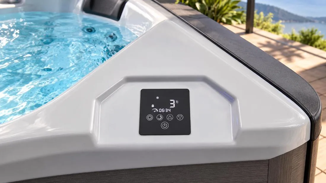Digital touchscreen control panel Close-up of built-in digital touch control panel on the tub ledge showing water temperature and timer