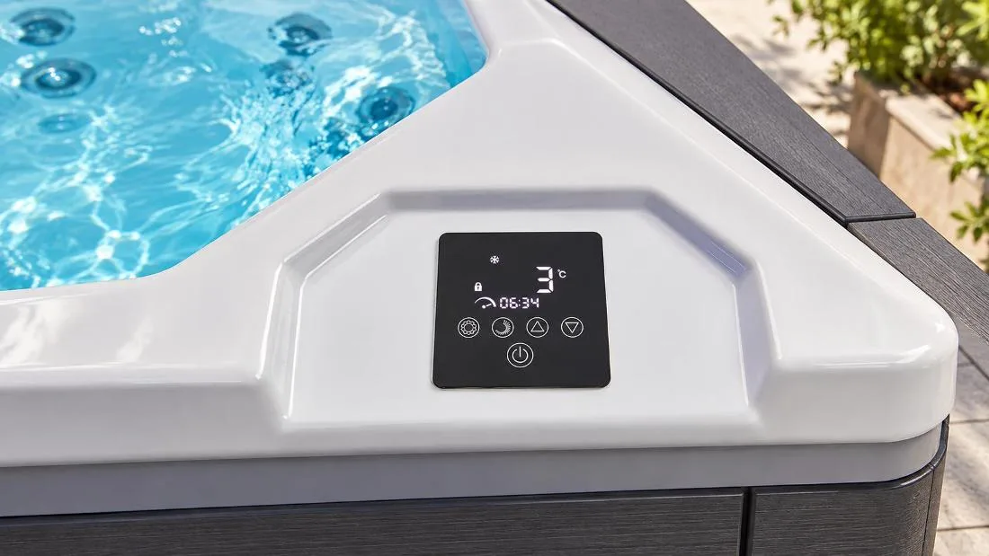 Digital Touchscreen Control Panel Close-up view of the built-in digital touch control panel on the white acrylic tub ledge displaying 3°C temperature readout